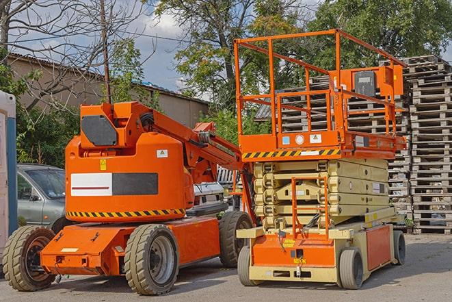 forklift transporting boxes in a busy warehouse in Cedar Grove, NJ